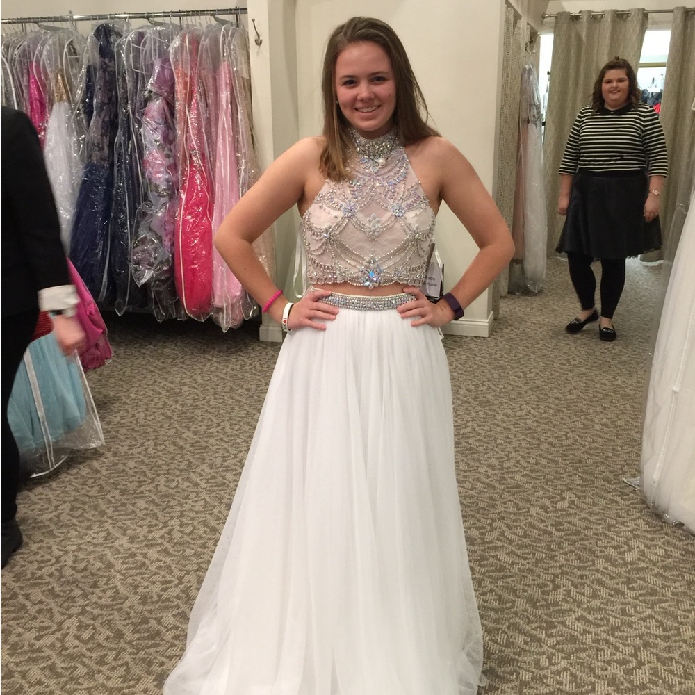 White designer prom or pageant dress